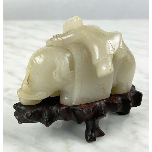 25A - CHINESE PALE CELEDON JADE CARVED ELEPHANT AND BOY, 9cm L x 8cm H.