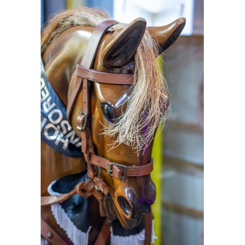 495 - STEVENSON BROTHERS ROCKING HORSE, 123cm H x 143cm L x 46cm W.