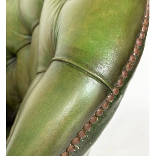 140 - ARMCHAIR, George III design mahogany with deep buttoned and studded green hide leather.