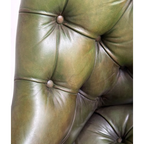 140 - ARMCHAIR, George III design mahogany with deep buttoned and studded green hide leather.