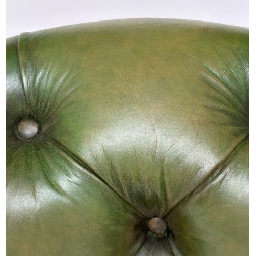 140 - ARMCHAIR, George III design mahogany with deep buttoned and studded green hide leather.