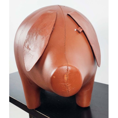 481 - PIG FOOTSTOOL, tan finish, 70cm x 30cm x 40cm approx.