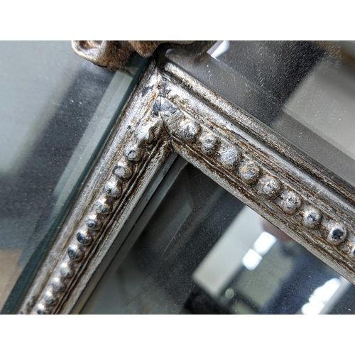 405 - WALL MIRROR, Continental style, mirrored frame with silvered detail, 114.5cm x 83cm.