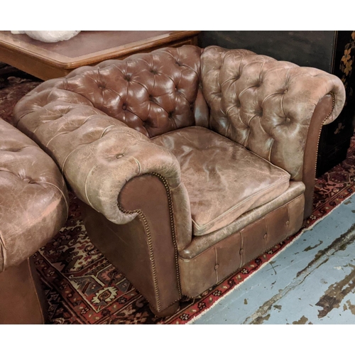 196 - CHESTERFIELD ARMCHAIRS, a pair, each 115cm W x 77cm H x 85cm D, brown buttoned leather. (2)