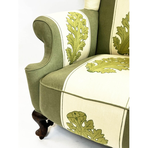 194 - WING ARMCHAIR, 118cm H x 83cm, late 19th/early 20th century, in green and cream acanthus leaf patter... 