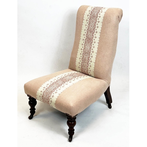 116 - SLIPPER CHAIR, 86cm H x 54cm, Victorian in pink patterned upholstery on castors.