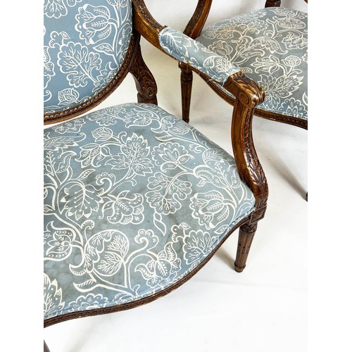 181 - FAUTEUILS, 103cm H x 66cm, a pair, late 19th/early 20th century French beechwood in patterned blue f... 