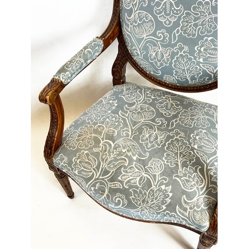 181 - FAUTEUILS, 103cm H x 66cm, a pair, late 19th/early 20th century French beechwood in patterned blue f... 