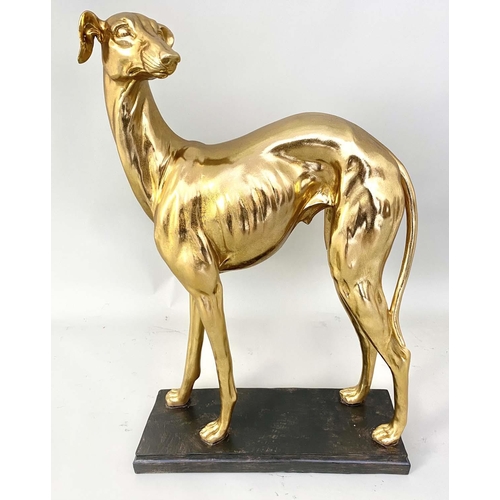 434 - SCULPTURAL WHIPPET, gilt resin, raised on a black plinth, 64cm x 43cm x 15cm.