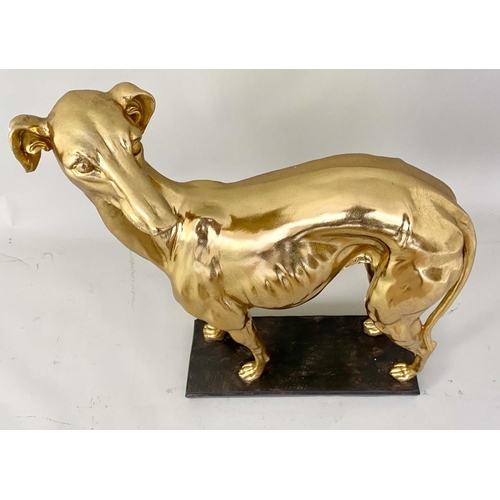 434 - SCULPTURAL WHIPPET, gilt resin, raised on a black plinth, 64cm x 43cm x 15cm.