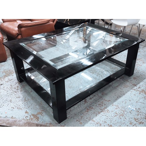 412 - LOW TABLE, black lacquered, two-tier form, glass surfaces, bevelled edged, 50cm H x 130cm W x 100cm ... 