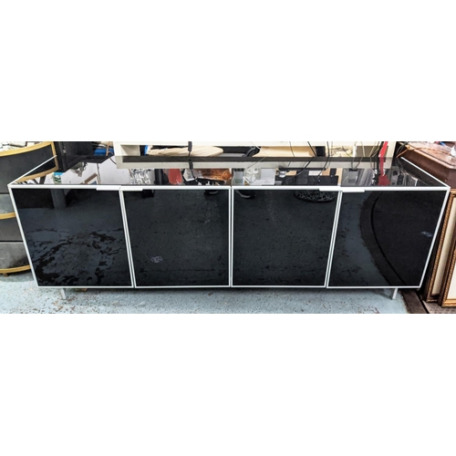 306 - SIDEBOARD, 204cm x 53cm x 67cm, smoked glass and metal, four door with two compartments, each with a... 