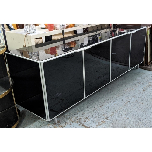 306 - SIDEBOARD, 204cm x 53cm x 67cm, smoked glass and metal, four door with two compartments, each with a... 