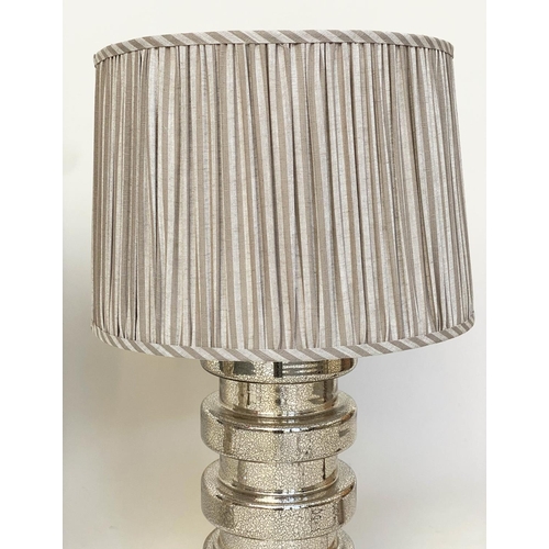 277 - TABLE LAMPS, a pair, silvered glass of circular ribbed drum form with pleated shades from India Jane... 