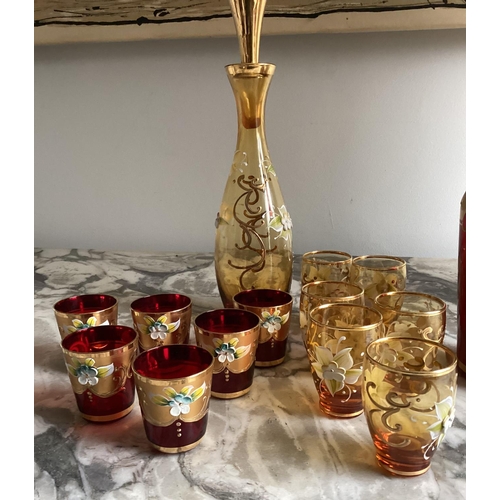 190 - LIQUEUR SET, Murano ruby and amber each with decanter and six glasses, (one labelled 'Murano', one B... 