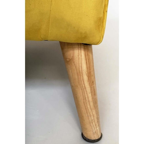 465 - ARMCHAIR, contemporary deep button primrose yellow velvet upholstered with swept splay ash supports,... 