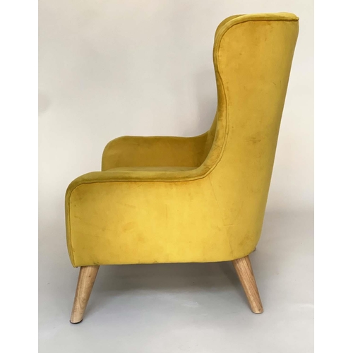 465 - ARMCHAIR, contemporary deep button primrose yellow velvet upholstered with swept splay ash supports,... 