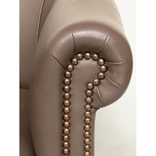 470 - TUB ARMCHAIR, fine mid brown leather upholstered with rounded back and studded scroll arms, 76cm W.