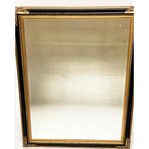 471 - WALL MIRROR, Italian style rectangular ebonised with bevelled mirror, gilt slip and gilt corners, 14... 