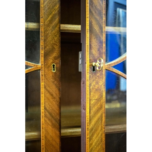 111 - SECRETAIRE BOOKCASE, 110cm W x 57cm D x 236cm, George III mahogany and tulipwood banded with glazed ... 