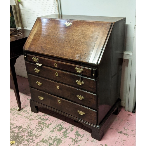 131 - BUREAU, George II, oak, circa 1750, the fall front opening to reveal fitted interior, over four long... 