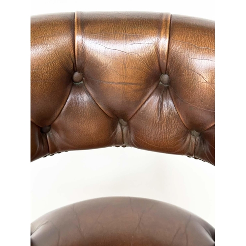 151 - ARMCHAIRS, a pair, mahogany and deep buttoned mid brown natural leather upholstered with curved back... 