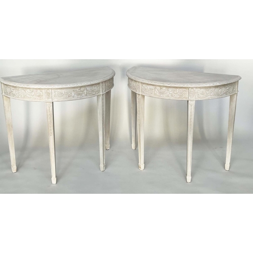 156 - CONSOLE TABLES, a pair, George III design demi lune grey painted each with carved frieze and square ... 