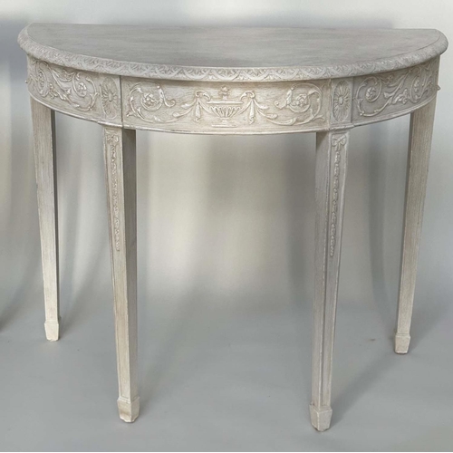 156 - CONSOLE TABLES, a pair, George III design demi lune grey painted each with carved frieze and square ... 