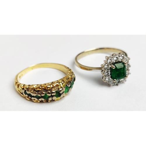 2 - AN EMERALD AND DIAMOND SET DRESS RING, white metal shank, probably 18ct white gold, the central emer... 
