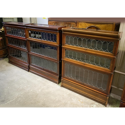 221 - GLOBE WERNICKE BOOKCASES, three matching, circa 1900 mahogany, each in sections with three leaded gl... 