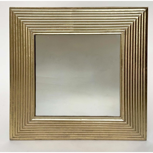 286 - WALL MIRROR, rectangular gilt metal reeded cushion form, 77cm x 77cm.