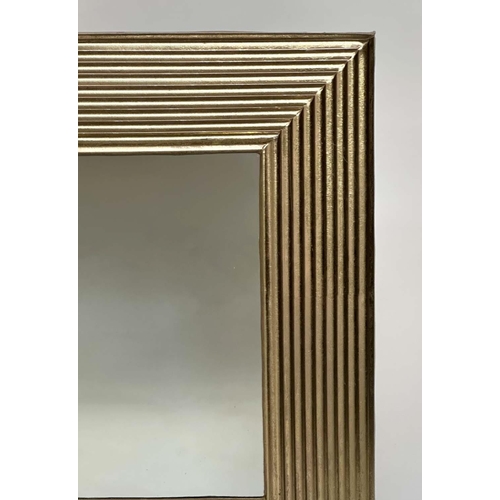 286 - WALL MIRROR, rectangular gilt metal reeded cushion form, 77cm x 77cm.