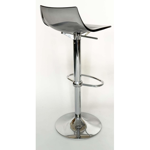 293 - BAR STOOLS, a pair, contemporary each with shaped lucite seat raised on pump action, chromium revolv... 