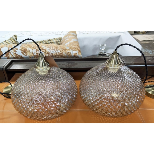 424 - CEILING PENDANT LIGHTS, a pair, 1970's Italian style, textured glass shades, 150cm drop each. (2)