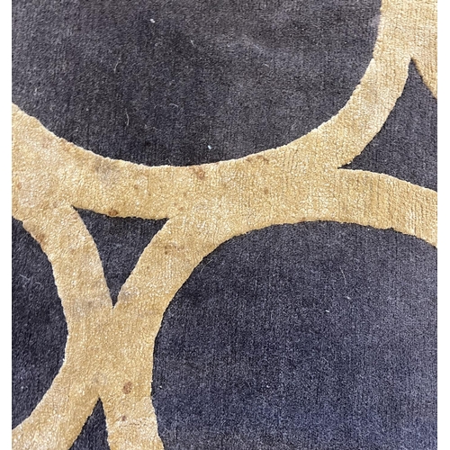 439 - THE RUG COMPANY CARPET, 368cm x 275cm, 'Gold Rings' designed by David Rockwell.