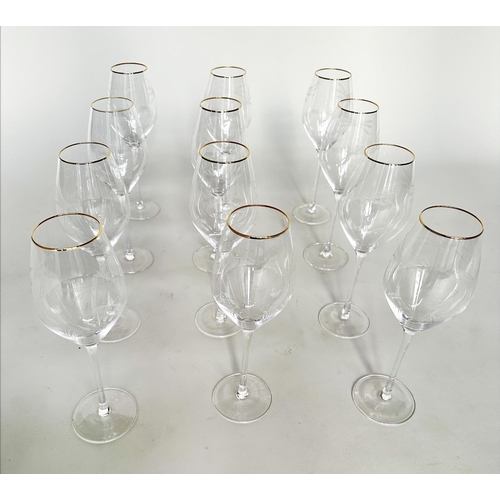 166 - PALM TREE DRINKING GLASSES, a set of twelve tall palm tree etched with gilded rim, 26cm H. (12)