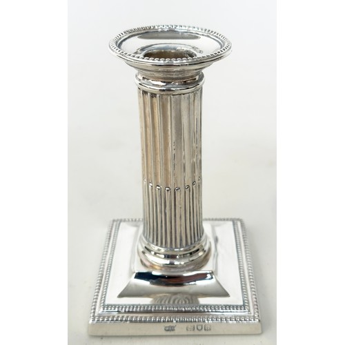 142 - CANDLESTICKS BY MAPPIN AND WEBB, a pair, silver stop fluted columns and square bases 1899, London, M... 