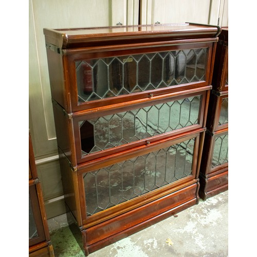 220 - GLOBE WERNICKE BOOKCASES, a near pair, circa 1900 mahogany, each in sections with three leaded glaze... 