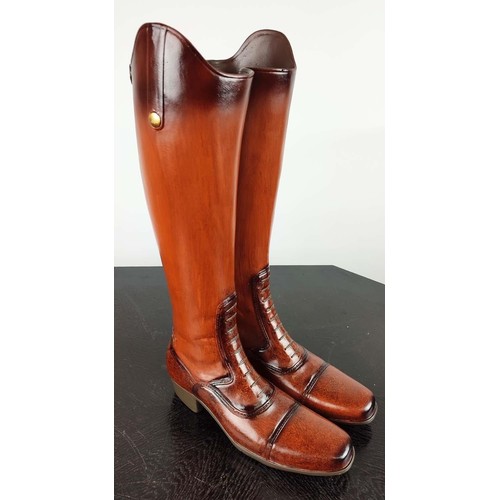 398 - STICK STANDS, a pair, faux riding boots design, painted resin, 48cm H each. (2)