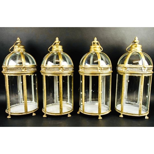 450 - STORM LANTERNS, a set of four, Regency style, gilt metal, 46cm H x 19cm diam. (4)