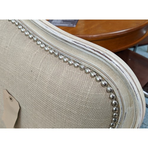 455 - ARMCHAIRS, a pair, French style, neutral upholstered, studded detail, 75cm W. (2)