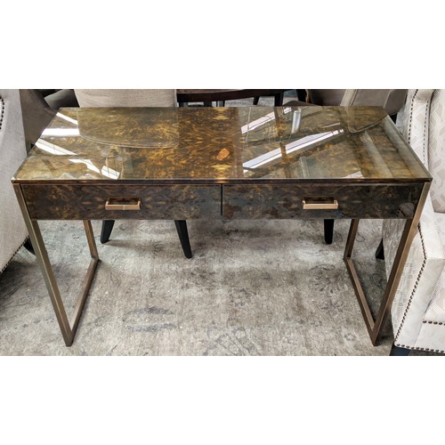 457 - VANITY TABLE, 120cm x 50cm x 75.5cm, tortoise shell effect glass, two drawers, gilt metal supports.