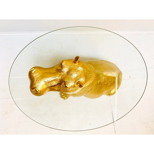 447 - HIPPOPOTAMUS LOW TABLE, 65cm x 50cm x 45cm, gilt finish to body, glass top.