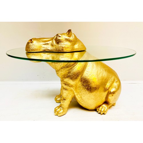 447 - HIPPOPOTAMUS LOW TABLE, 65cm x 50cm x 45cm, gilt finish to body, glass top.