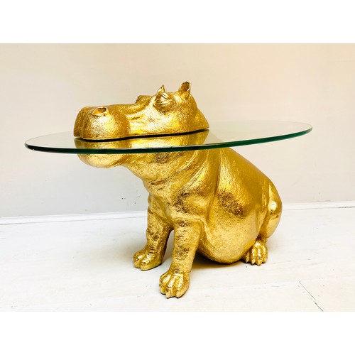 447 - HIPPOPOTAMUS LOW TABLE, 65cm x 50cm x 45cm, gilt finish to body, glass top.