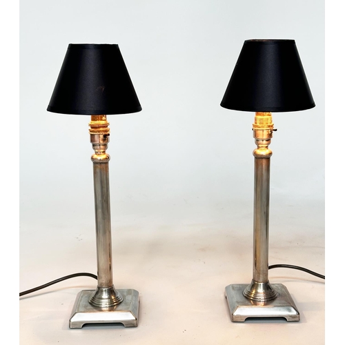 155 - TABLE LAMPS, a pair, Georgian style silvered of column form with shades, 42cm H. (2)