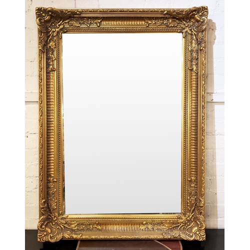 493 - WALL MIRROR, 111cm x 80cm, rectangular gilt framed of recent manufacture.