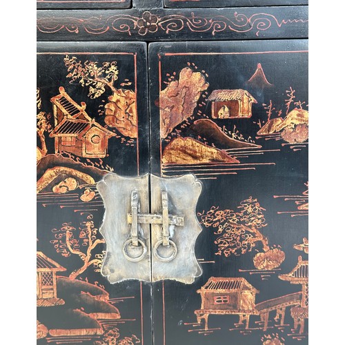 160 - CHINESE SIDE CABINETS, a pair, Chinese lacquered and gilt Chinoiserie decorated each with two drawer... 