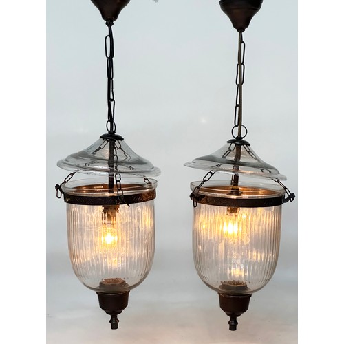 179 - BELL JAR HALL LANTERNS, a pair, glass reeded tapering and bronze style mounted, 58cm x 34cm H. (2)