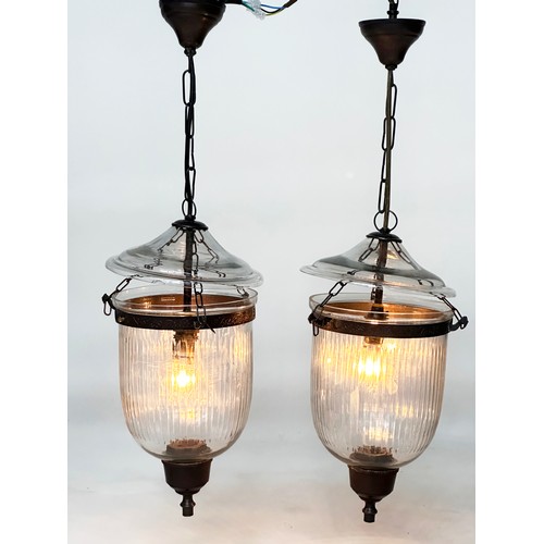 179 - BELL JAR HALL LANTERNS, a pair, glass reeded tapering and bronze style mounted, 58cm x 34cm H. (2)